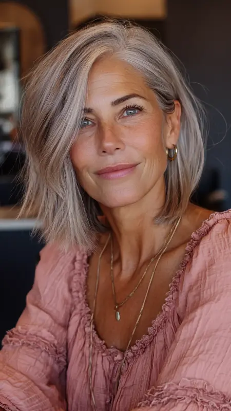 Feathered Lob with Side-Swept Bangs - Shoulder Length Hairstyles For Women Over 60